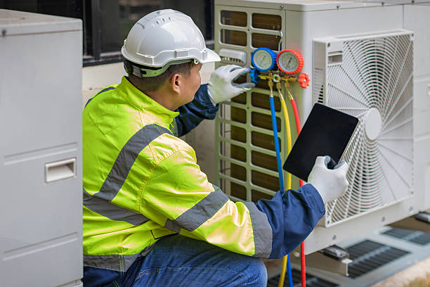Professional Air Conditioning Repair technician working in Reno, OH